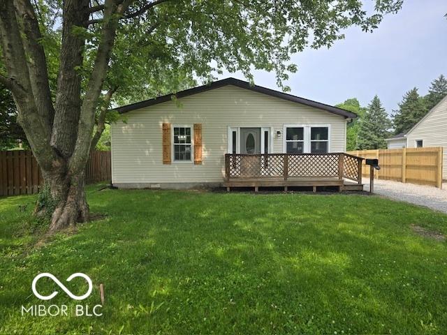 450 N Fenton Ave, Indianapolis, IN 46219 - rear view of house with a wooden deck