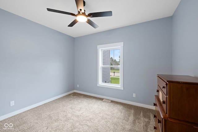 4545 Caroline Grace Ln, Terre Haute, IN 47802 - spare room with ceiling fan and carpet floors