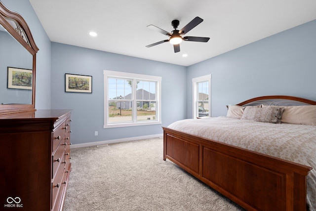 4545 Caroline Grace Ln, Terre Haute, IN 47802 - bedroom with light carpet, recessed lighting, and a ceiling fan