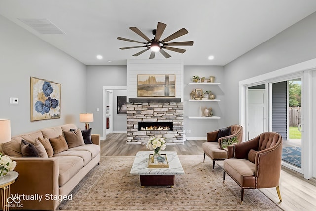 4545 Caroline Grace Ln, Terre Haute, IN 47802 - living area with ceiling fan, wood finished floors, a fireplace, and recessed lighting