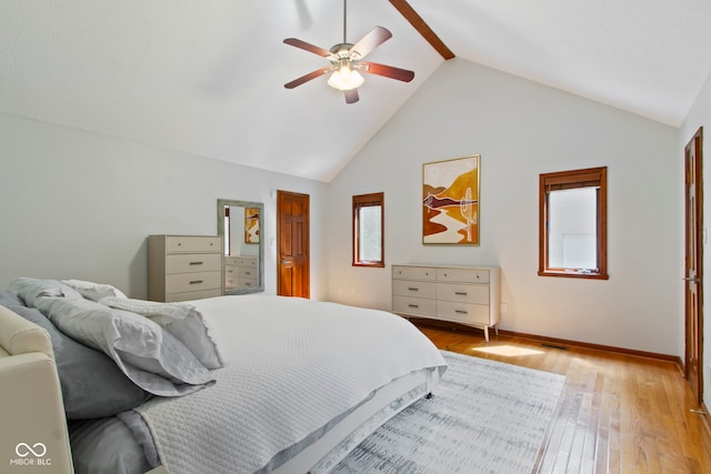 7426 Shadow Wood Dr, Indianapolis, IN 46254 - bedroom with light wood-type flooring, vaulted ceiling, baseboards, and ceiling fan