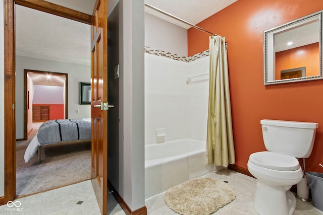 7426 Shadow Wood Dr, Indianapolis, IN 46254 - bathroom with shower / bath combo with shower curtain, connected bathroom, a textured ceiling, toilet, and tile patterned floors