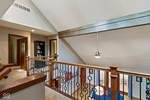 7426 Shadow Wood Dr, Indianapolis, IN 46254 - hall featuring carpet, an upstairs landing, high vaulted ceiling, and recessed lighting