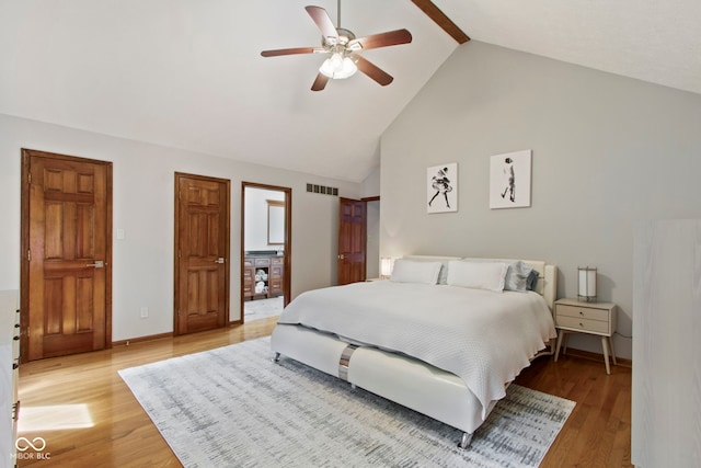 7426 Shadow Wood Dr, Indianapolis, IN 46254 - bedroom with light wood finished floors, high vaulted ceiling, ceiling fan, and baseboards