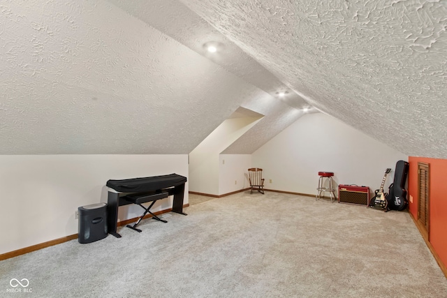 7426 Shadow Wood Dr, Indianapolis, IN 46254 - additional living space with a textured ceiling, carpet flooring, vaulted ceiling, and baseboards