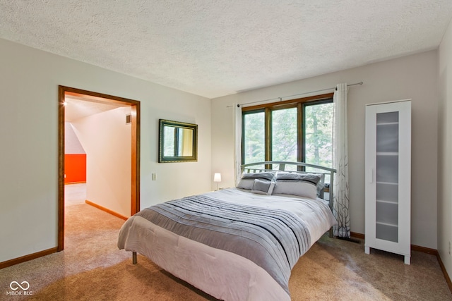 7426 Shadow Wood Dr, Indianapolis, IN 46254 - bedroom featuring light carpet, baseboards, and a textured ceiling
