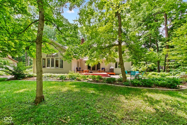 7426 Shadow Wood Dr, Indianapolis, IN 46254 - view of green lawn with a patio