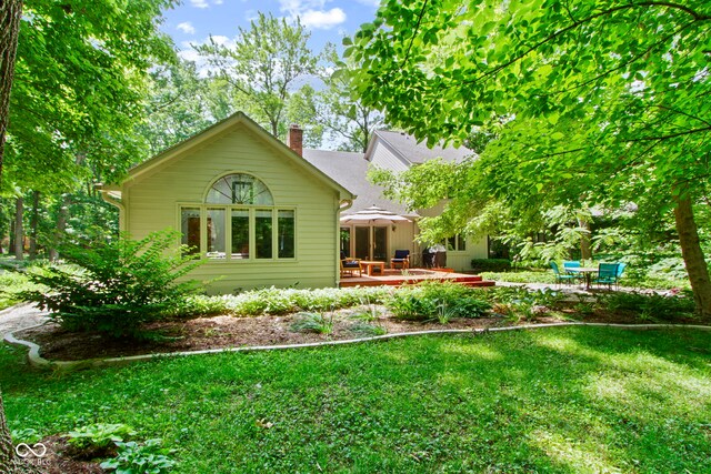 7426 Shadow Wood Dr, Indianapolis, IN 46254 - back of property with a patio area and a lawn