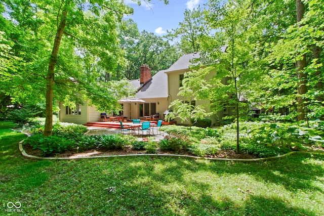 7426 Shadow Wood Dr, Indianapolis, IN 46254 - view of green lawn featuring a patio