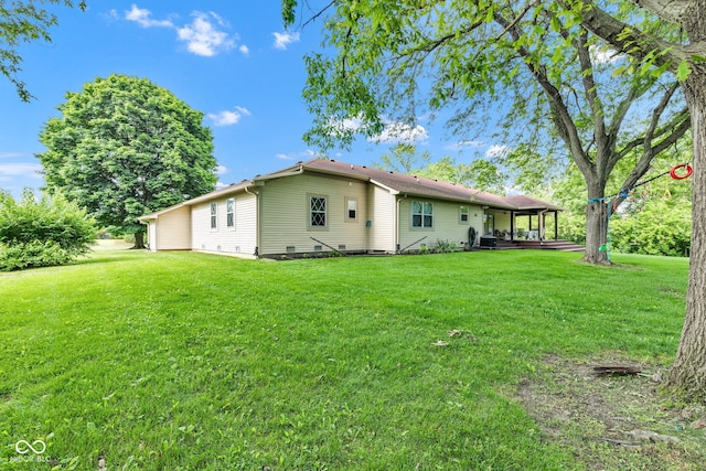 12121 E 21st St, Indianapolis, IN 46229 - rear view of house featuring a yard