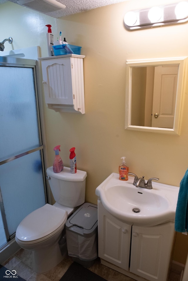 7402 Broadview Dr, Indianapolis, IN 46227 - bathroom featuring vanity, toilet, and a shower