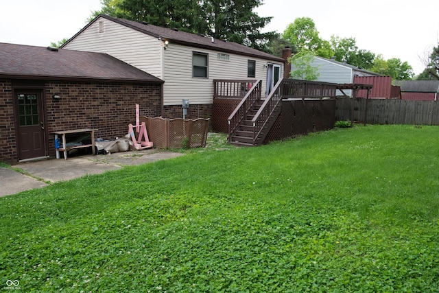 7402 Broadview Dr, Indianapolis, IN 46227 - back of house featuring a deck, brick siding, stairs, and a shingled roof