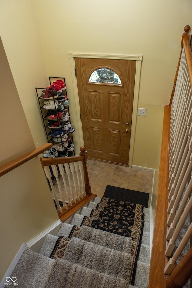 7402 Broadview Dr, Indianapolis, IN 46227 - entryway featuring stairway and baseboards