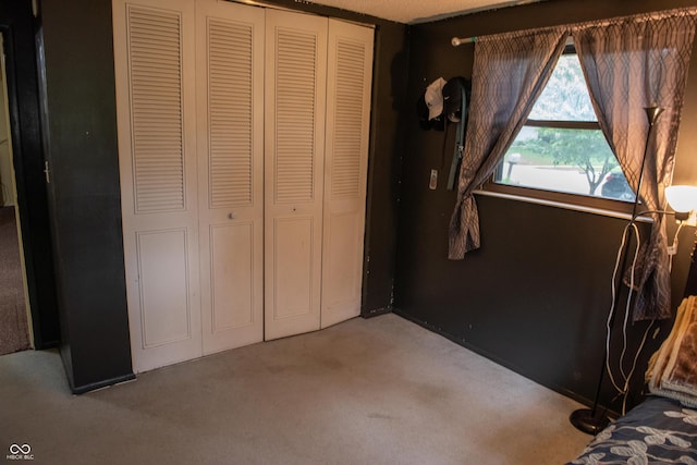 7402 Broadview Dr, Indianapolis, IN 46227 - unfurnished bedroom featuring a closet and carpet floors