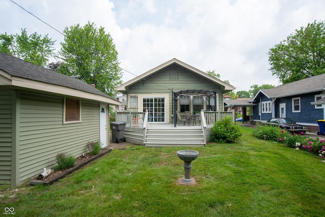 5133 E Michigan St, Indianapolis, IN 46219 - view of front of property featuring a wooden deck and a front lawn