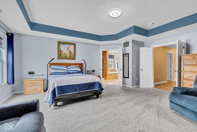 13766 Heatherfield Dr, Fishers, IN 46038 - carpeted bedroom featuring baseboards, a textured ceiling, and connected bathroom