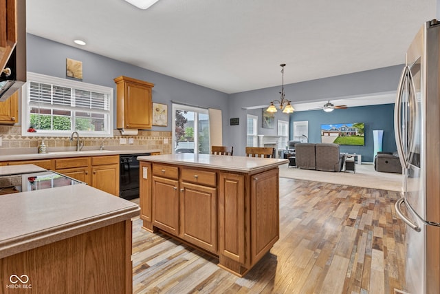 13766 Heatherfield Dr, Fishers, IN 46038 - kitchen with smart refrigerator, dishwasher, a sink, a kitchen island, and light wood-style floors