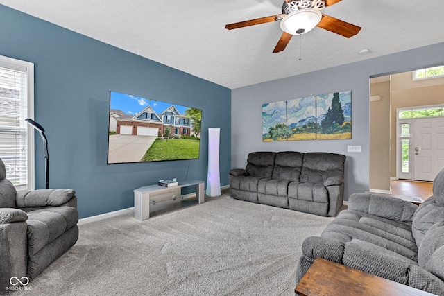 13766 Heatherfield Dr, Fishers, IN 46038 - living room featuring a ceiling fan, carpet floors, and baseboards