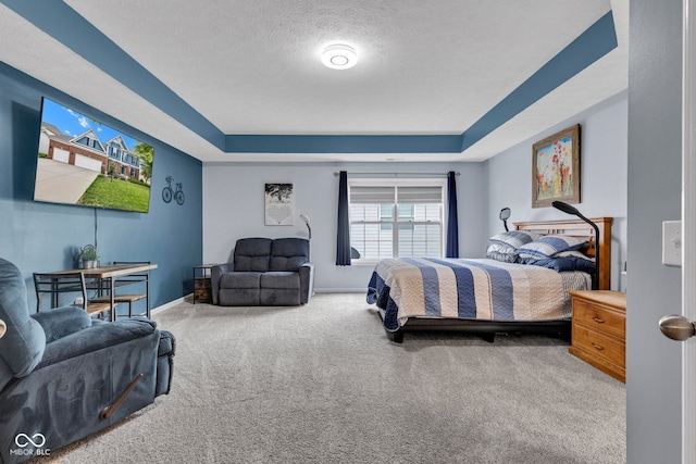 13766 Heatherfield Dr, Fishers, IN 46038 - bedroom with a raised ceiling, carpet flooring, a textured ceiling, and baseboards