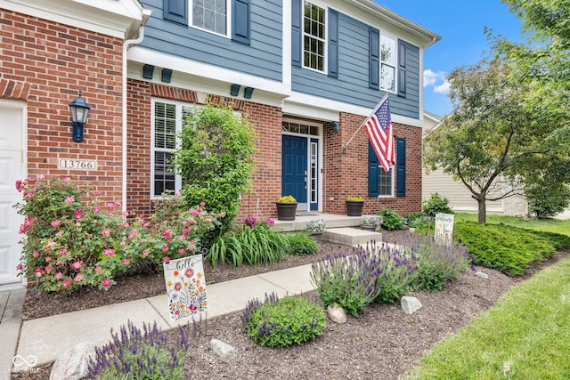 13766 Heatherfield Dr, Fishers, IN 46038 - doorway to property featuring brick siding