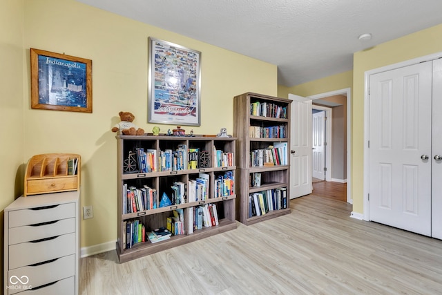 13766 Heatherfield Dr, Fishers, IN 46038 - sitting room with wood finished floors and baseboards