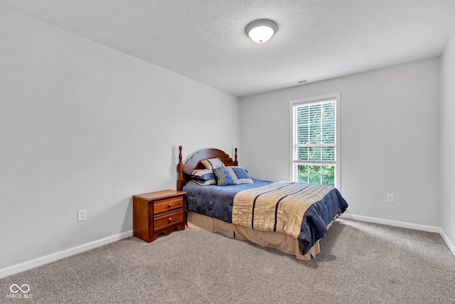 13766 Heatherfield Dr, Fishers, IN 46038 - carpeted bedroom featuring baseboards and a textured ceiling