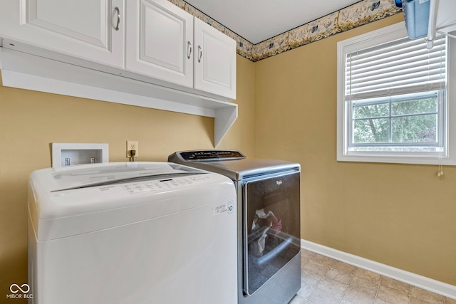 13766 Heatherfield Dr, Fishers, IN 46038 - washroom featuring cabinet space, baseboards, and washer and clothes dryer