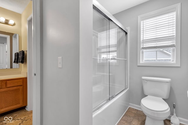 13766 Heatherfield Dr, Fishers, IN 46038 - full bath featuring toilet, vanity, baseboards, and shower / bath combination with glass door