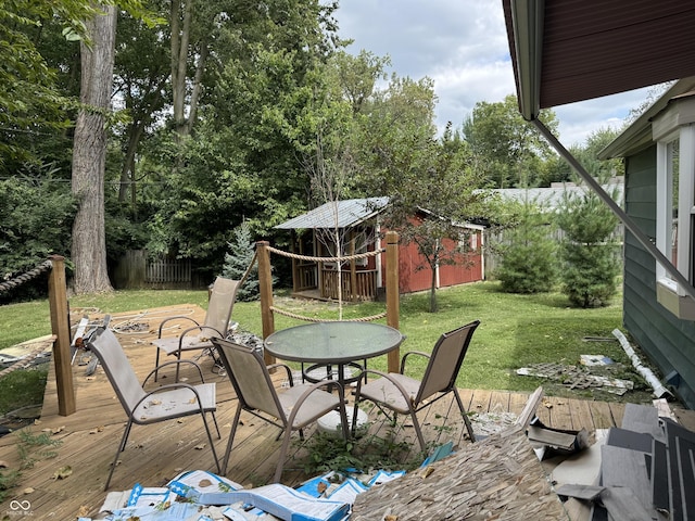 1206 Mcdougal St, Indianapolis, IN 46203 - view of patio featuring a deck and an outbuilding