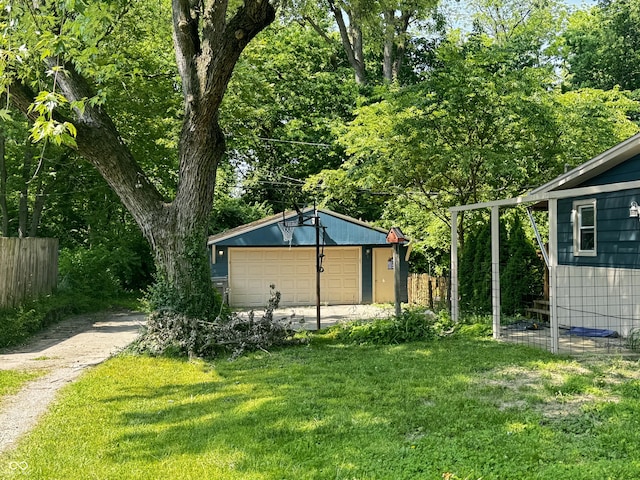 1206 Mcdougal St, Indianapolis, IN 46203 - view of yard with an outbuilding and a detached garage