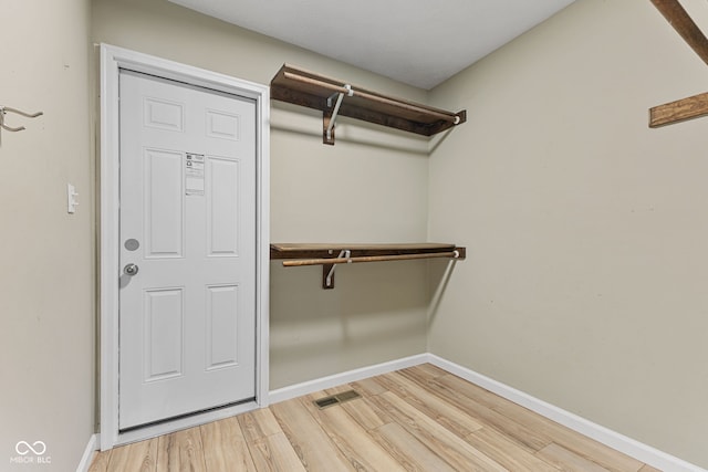 7630 Blain Way, Indianapolis, IN 46254 - spacious closet with light wood-style flooring
