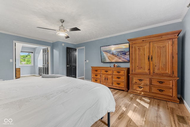 7630 Blain Way, Indianapolis, IN 46254 - bedroom featuring light wood finished floors, baseboards, a ceiling fan, ornamental molding, and ensuite bathroom