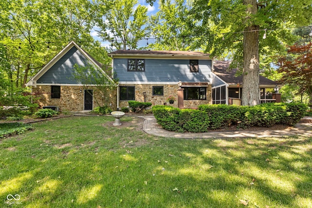 7630 Blain Way, Indianapolis, IN 46254 - rear view of property with a yard
