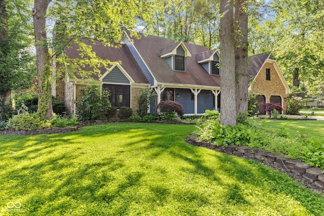 7630 Blain Way, Indianapolis, IN 46254 - cape cod house with a front lawn, brick siding, and a shingled roof