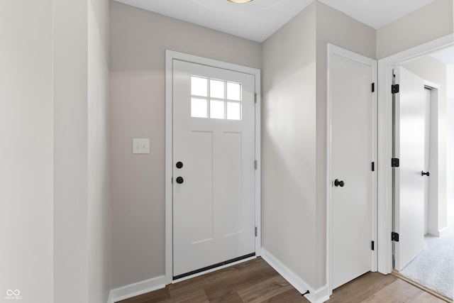 1313 Kenwood Dr, Greenwood, IN 46143 - entryway with wood finished floors and baseboards