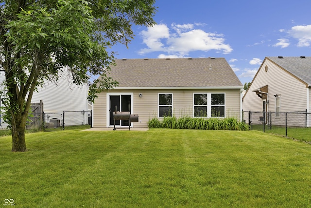 1313 Kenwood Dr, Greenwood, IN 46143 - rear view of property featuring a gate and roof with shingles