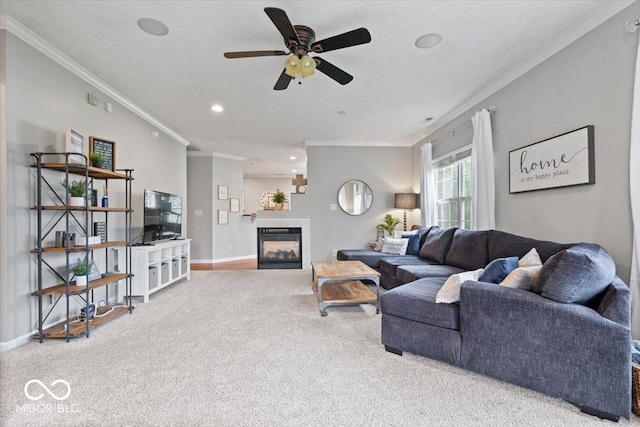 1905 Persimmon Grove Dr, Indianapolis, IN 46234 - living room with carpet floors, crown molding, a multi sided fireplace, ceiling fan, and recessed lighting