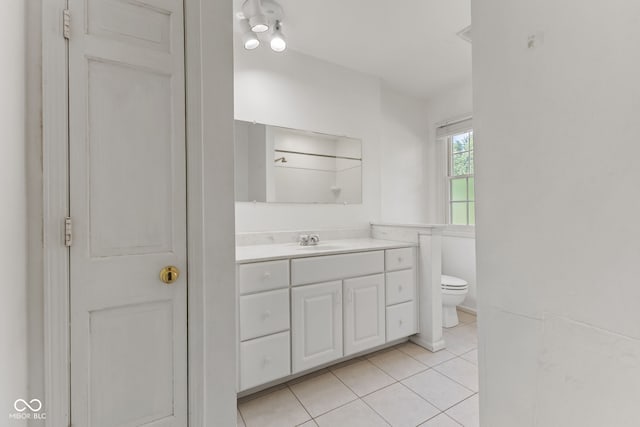 308 Hickory Hill Dr, Terre Haute, IN 47802 - bathroom featuring toilet, vanity, and tile patterned floors