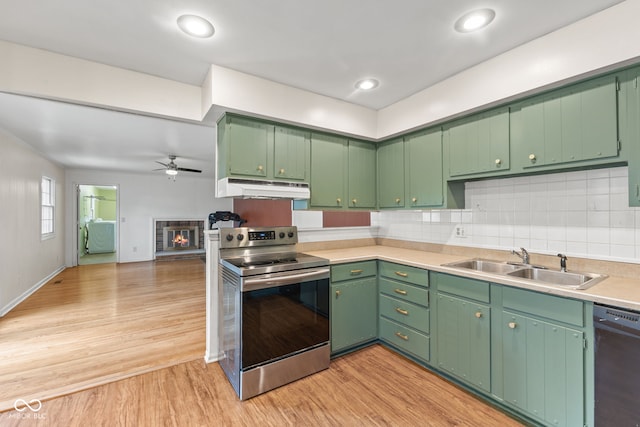 308 Hickory Hill Dr, Terre Haute, IN 47802 - kitchen with electric range, under cabinet range hood, a sink, dishwasher, and ceiling fan