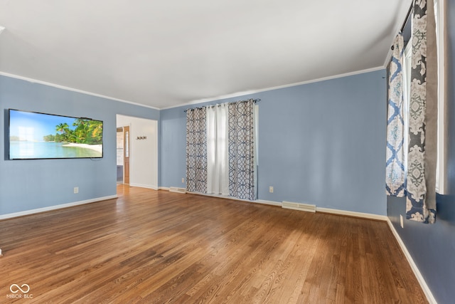 308 Hickory Hill Dr, Terre Haute, IN 47802 - unfurnished room featuring wood finished floors, crown molding, and baseboards