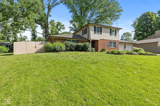 308 Hickory Hill Dr, Terre Haute, IN 47802 - view of front of property with brick siding and an attached garage
