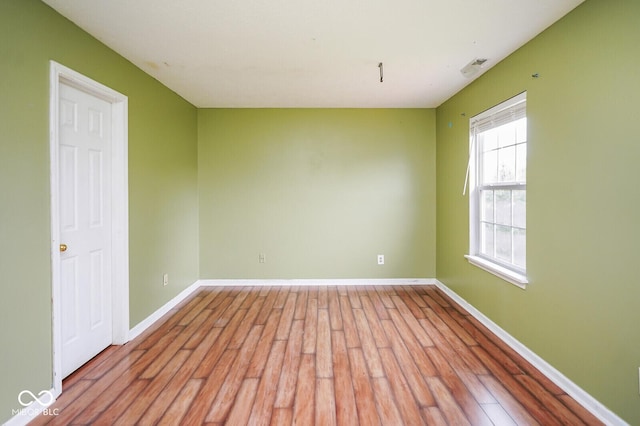 11198 N 650 W, Fountaintown, IN 46130 - spare room with light wood-style floors and baseboards