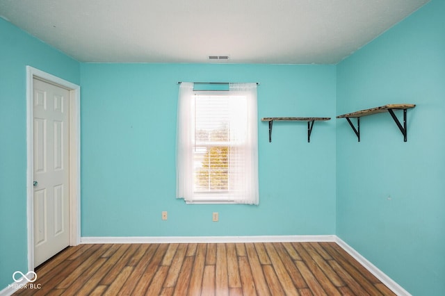 11198 N 650 W, Fountaintown, IN 46130 - unfurnished room with baseboards and wood finished floors