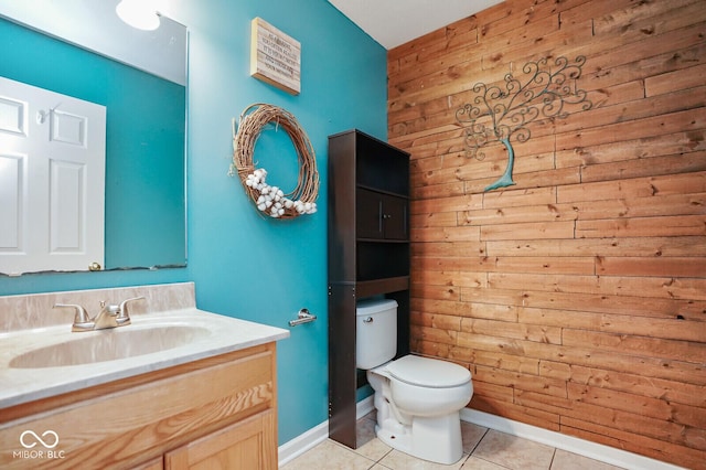 11198 N 650 W, Fountaintown, IN 46130 - half bathroom with toilet, vanity, wood walls, tile patterned floors, and baseboards