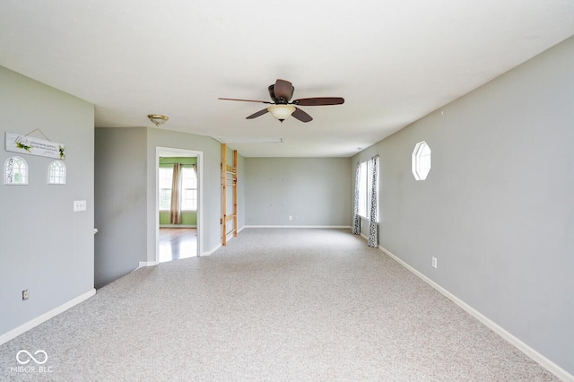 11198 N 650 W, Fountaintown, IN 46130 - carpeted empty room with ceiling fan, plenty of natural light, and baseboards