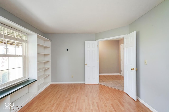 11198 N 650 W, Fountaintown, IN 46130 - unfurnished room featuring light wood-style floors and baseboards