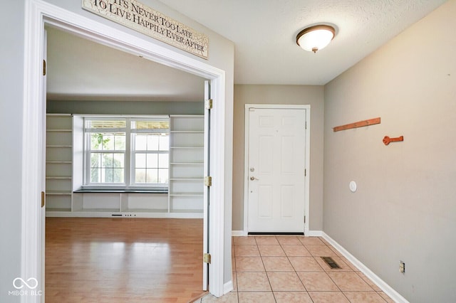 11198 N 650 W, Fountaintown, IN 46130 - entrance foyer featuring baseboards and light tile patterned flooring