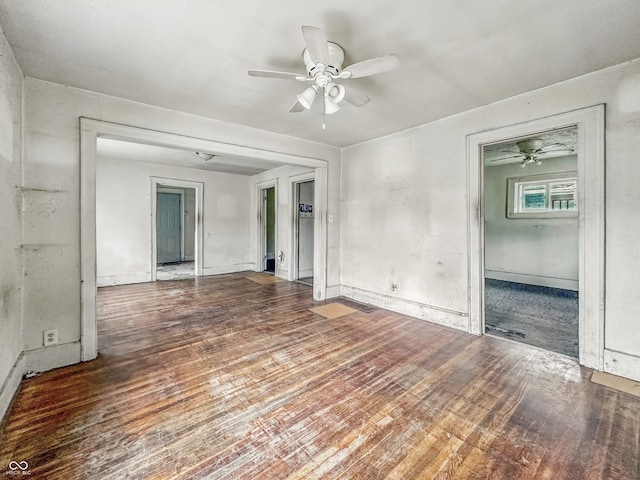 3526 E Vermont St, Indianapolis, IN 46201 - unfurnished room featuring a ceiling fan and wood finished floors
