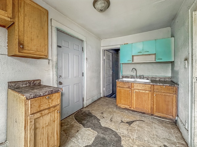 3526 E Vermont St, Indianapolis, IN 46201 - kitchen featuring a sink and dark countertops