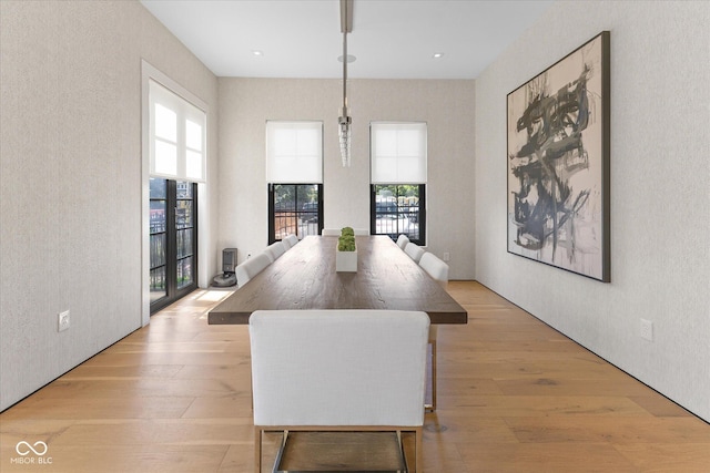 1818 N Pennsylvania St, Indianapolis, IN 46202 - dining area with plenty of natural light, a textured wall, and light wood-type flooring